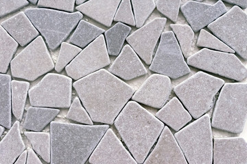 Porcelain stonewear tiles of gray stones. Background from gray stones.