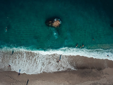 Aerial View From Flying Drone Of People Relaxing