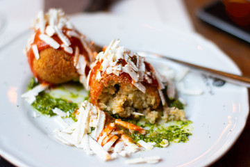 Fried Croquettes On A Place On A Table In an Italian Restaurant In Rome, Italy.