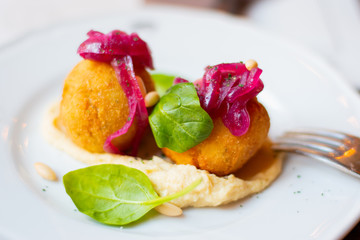 Fried Croquettes On A Place On A Table In an Italian Restaurant In Rome, Italy.