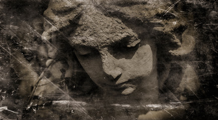 Death. Close up retro styled sad angel as symbol of pain, fear and end of life. Ancient sculpture.