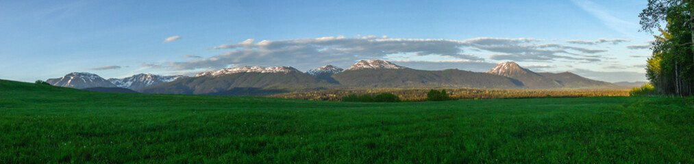 Green Fields and Coastal Mountains