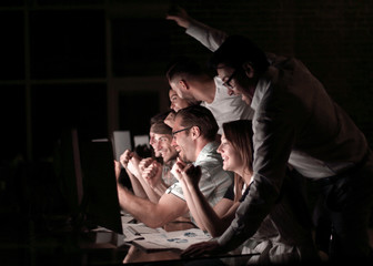 young business team analyzing computer data