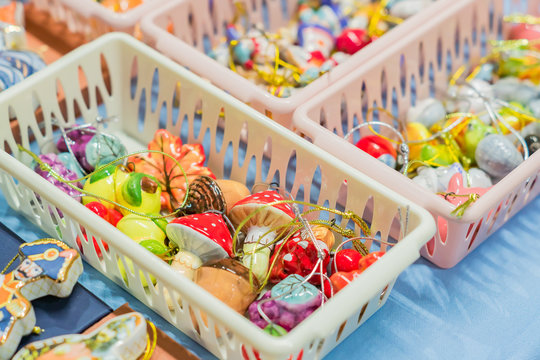 close up of plastic backets with small souvenirs from Russia.