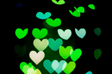 Fototapeta premium Heart bokeh background, Love and Valentine day concept. Multicolored Shiny hearts light