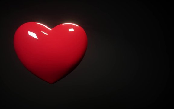 Red heart isolated on black background. Halth. Cardiology. Heart beating. Copy space.