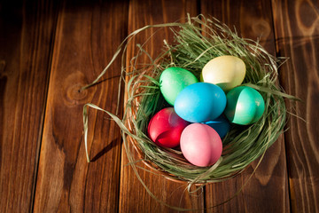 Easter eggs on wooden planks