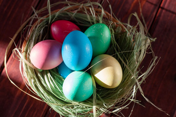 Easter eggs on wooden planks