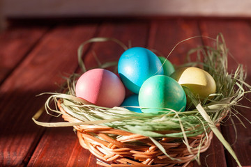 Easter eggs on wooden planks
