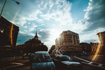 Angular view of traffic in the streets of Pamplona, Spain. Cloudy sky
