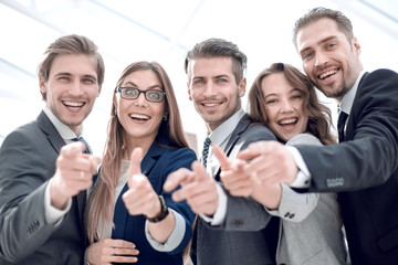 Many happy peoples hands together as team for motivation