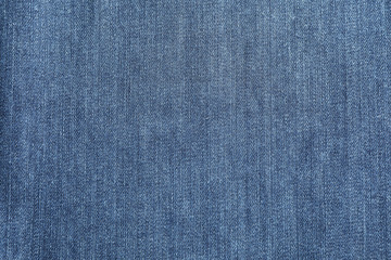 Texture of blue jeans as background, space for text