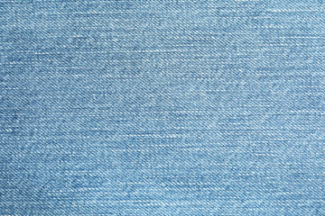 Texture of blue jeans as background, space for text