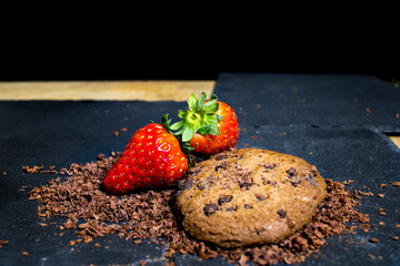 Strawberries with chocolate cookie black board