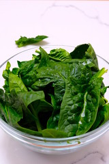 A bowl with green, fresh spinach