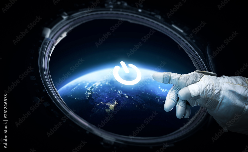 Fototapete Astronaut click on power button on hud display in the porthole. Earth on the background. Elements of this image furnished by NASA