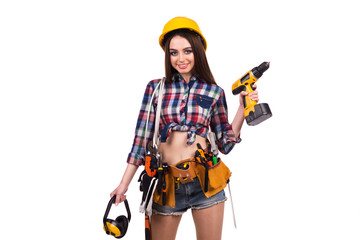 beautiful girl builder with a tool on the belt on a white background