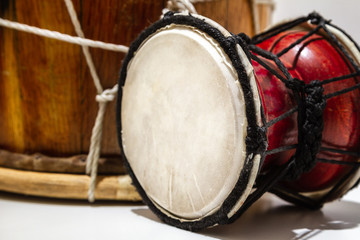 Fototapeta na wymiar ethnic percussion musical instruments, drums of different sizes 