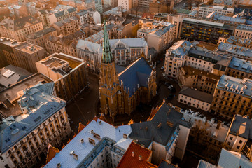 Panorama view of Riga city sunset near the old town including suspension bridge and main cathedral...