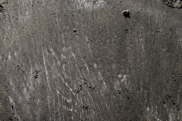 Black sand beach background and texture.