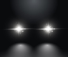 Cars light effect. White glow car headlight bright beams ray isolated on black background © kolonko