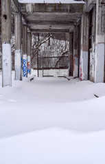abandoned and derelict factory ruins in winter