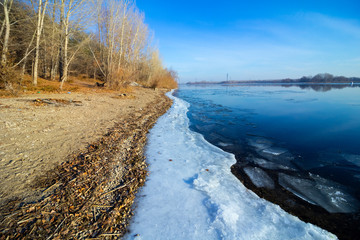 Coast of a frozen river