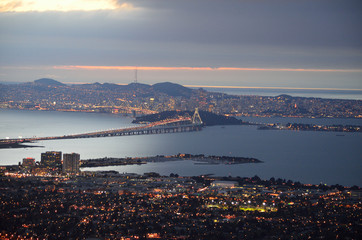 sunset on san francisco bay with panoramic view of the city