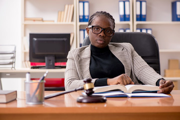 Black female lawyer in courthouse 
