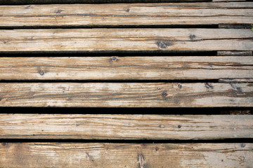 Fragment of wet wood floor after the rain