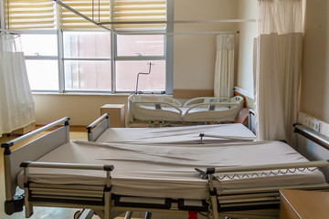Hospital room empty patient beds