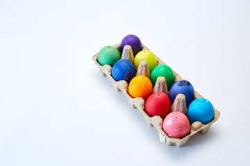 Fototapeta na wymiar Colorful Easter eggs in box