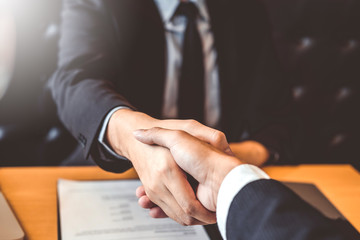 Shaking hands Business people greeting new colleagues while job interviewing shaking hands meeting Planning after during job interview Concept