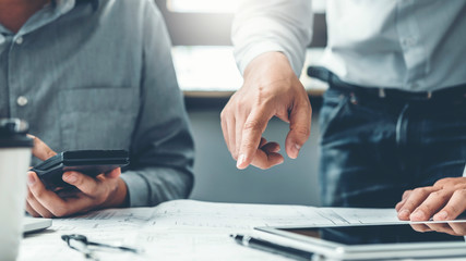 Engineer meeting for architectural project and working with partner engineering on workplace