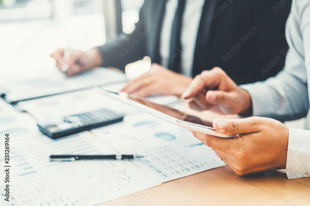 Poster Co-working Business Team meeting Planning with digital tablet Strategy Analysis investment and saving concept. meeting discussing new plan financial graph data.