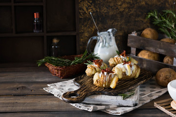 Baked potato with bacon and fresh yogurt