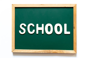 Green blackboard and wood frame with word school on white background