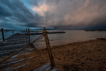 Stormy weather clouds at sunset over Lake Tahoe