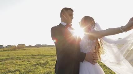 Wedding couple. Lovely groom and bride.  Happy family. Man and woman in love. Wedding day. Slow motion	