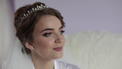 Beautiful and lovely bride in night gown. Wedding morning. Pretty and well-groomed woman. Slow motion