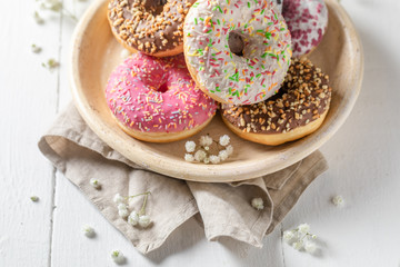 Tasty and homemade donuts with various types of toppings