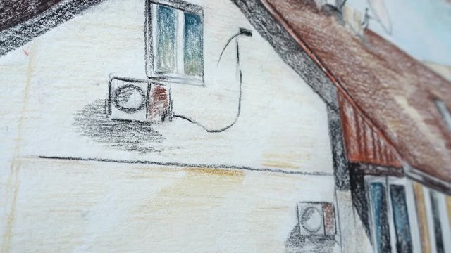 Drawing of the house. Shooting in the movement. Shooting of the drawing.