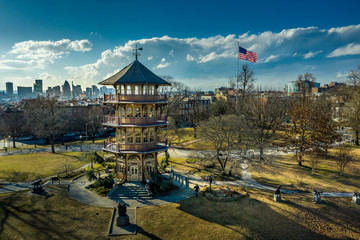 Patterson Park Pagoda During Winter in Baltimore, Maryland, USA with American Flag - obrazy, fototapety, plakaty