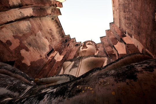 Up angle of Buddha image in a antique temple