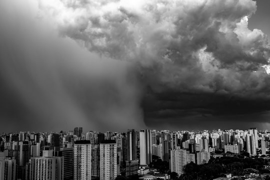 Beautiful view of the dramatic dark stormy sky in black and white. The rain is coming soon. Pattern of the clouds over city. Very heavy rain sky in Sao Paulo city, Brazil South America. 