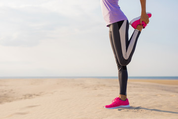 Woman stretching before workout