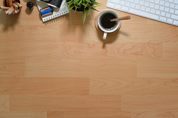 Workplace office wooden desk with camera, films and copy space