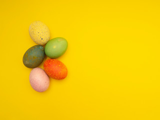 Colorful Easter Eggs On Yellow Background