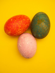 Colorful Easter Eggs On Yellow Background