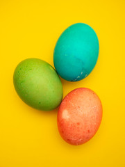 Colorful Easter Eggs On Yellow Background